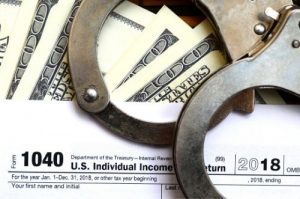 Whitman Tax Fraud Defense criminal tax segment block 300x199